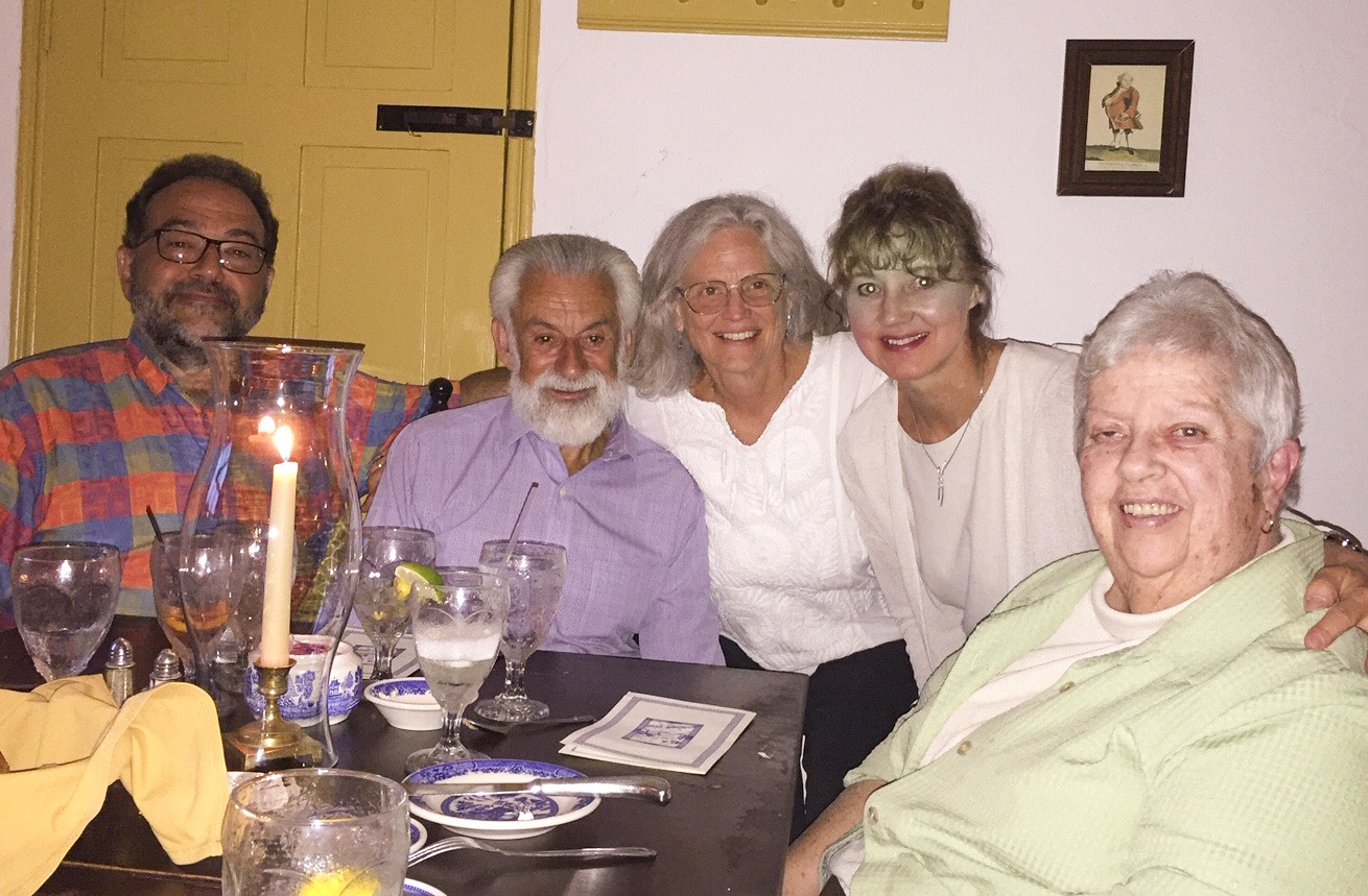 Candace Kugel (center), Laszlo Madaras, and Ed Zuroweste at dinner with Keystone Health staff