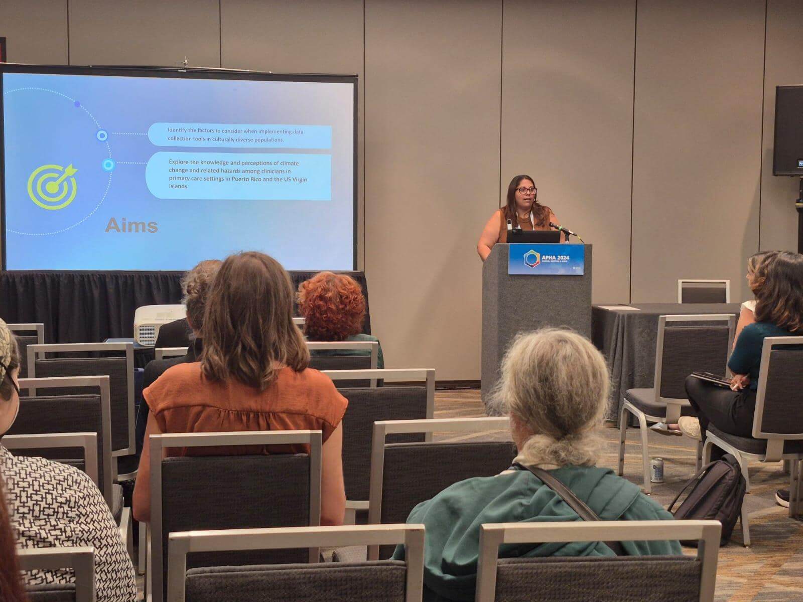 Dr. Marysel Pagan presenting her project, "Understanding the climate change perceptions and literacy among clinicians in Puerto Rico and US Virgin Islands"