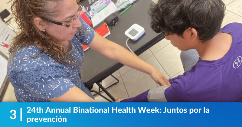 Volunteer providing a blood pressure test to a patient. The heading reads, 24th Annual Binational Health Week: Juntos por la prevención.