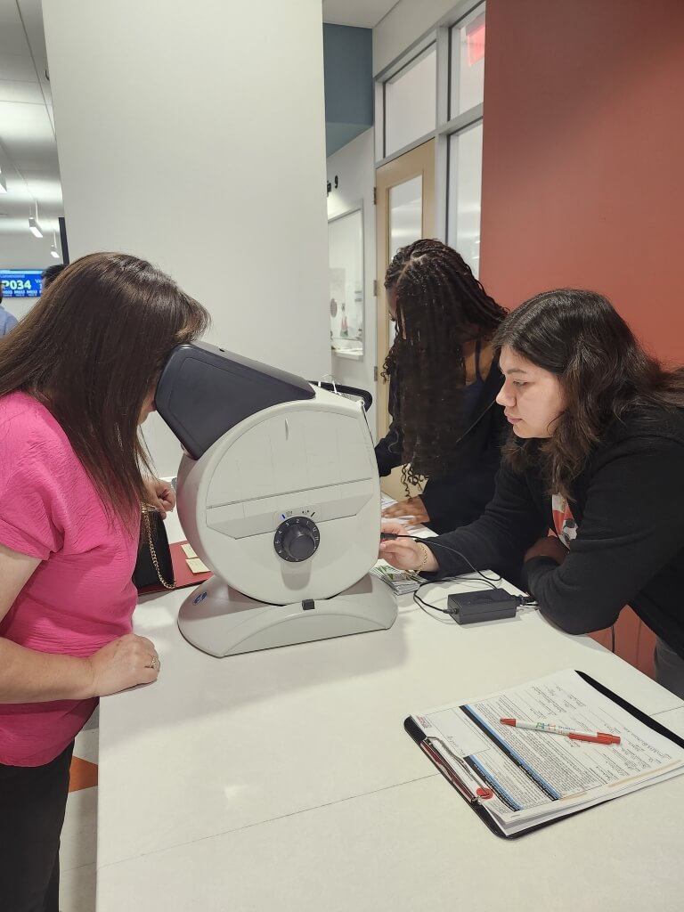 Patient receives an eye exam.